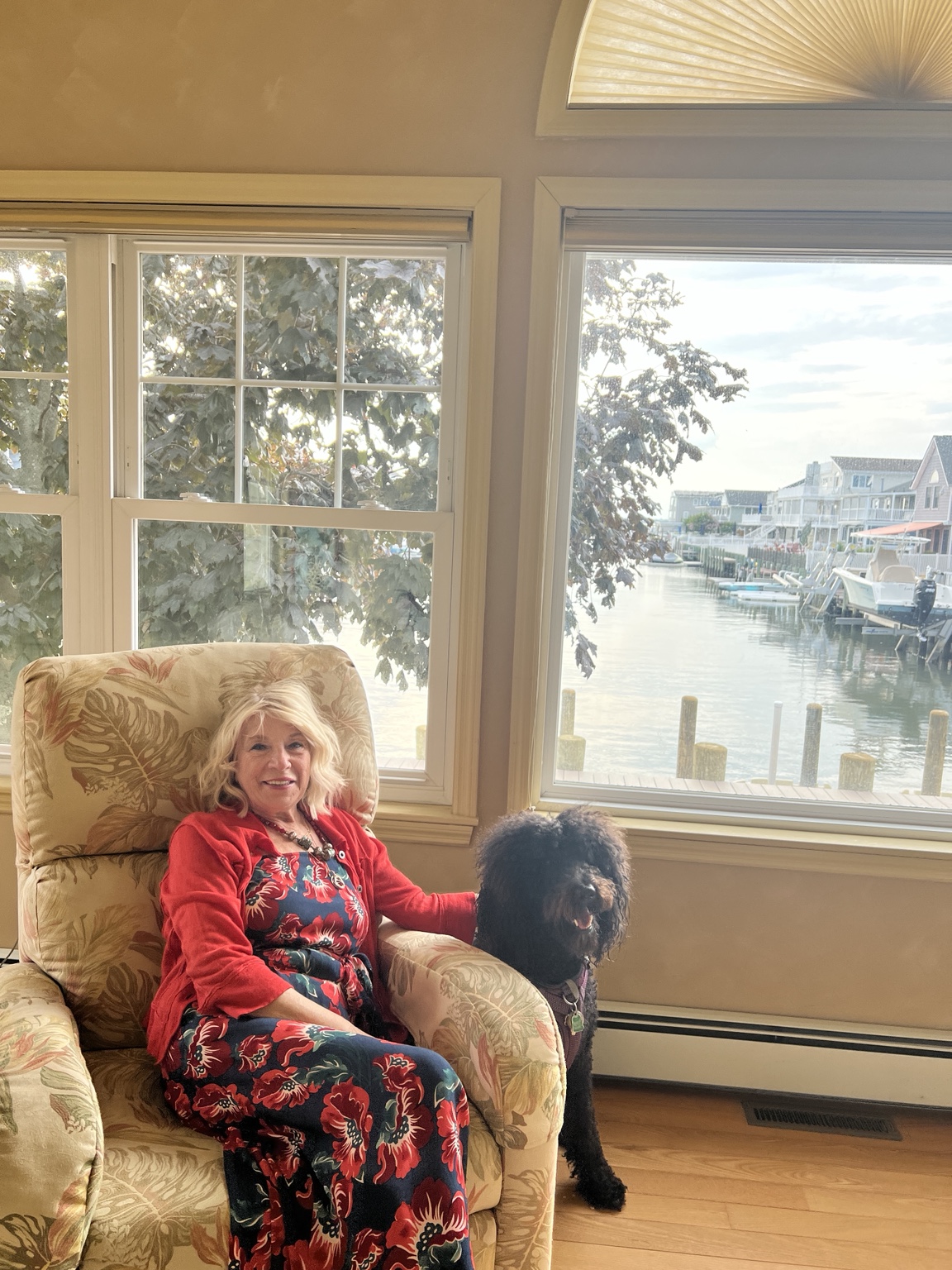 A family member relaxing in a waterfront home